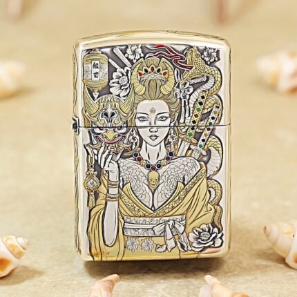 Silver-plated Zippo Armor lighter with engraved female-warrior artwork and gold inlay