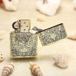 Open Beauty and Skull Zippo Armor lighter showing engraved floral detail on the case