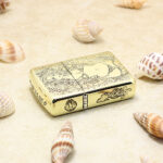 Angled view of the brass Zippo Armor lighter highlighting its figure and floral artwork