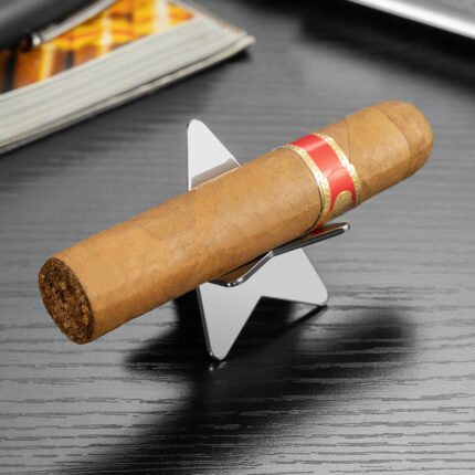 CigarLoong CS-004 star metal cigar rest holding a cigar