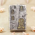 Grotto Buddha figures engraved on the silver Zippo Armor lighter