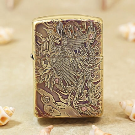 High-polish brass Zippo Armor lighter with engraved legendary phoenix
