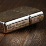 Four Horsemen high-polish chrome Zippo Armor lighter with original packaging