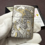 Silver-plated Zippo Armor lighter with Guanyin Bodhisattva engraving and gold inlay