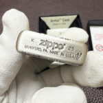 Reverse devotional artwork on the Guanyin silver Zippo Armor case