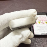 Engraved border detail on the silver-plated Guanyin Zippo case