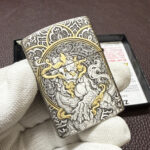 Armor base stamp detail on the silver-plated Guanyin Zippo