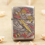 Smoked-silver Zippo Armor lighter with engraved Zhao Yun artwork and gold accents