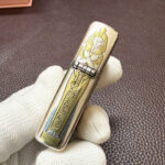 Windproof insert and chimney shown with the Egyptian pharaoh Armor lighter