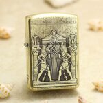 Brass Zippo Armor lighter with engraved Egyptian pharaoh artwork