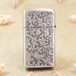 Zippo Slim arabesque scrollwork jacket lighter, reverse view