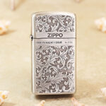 Zippo Slim silver arabesque engraved jacket lighter, front view