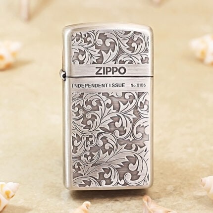 Zippo Slim silver arabesque engraved jacket lighter, front view