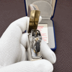 Zippo No.15 2001 sterling silver lighter open in blue presentation box