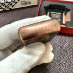 Zippo Armor 29736 Tiki Design Antique Copper finish close-up