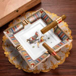 CigarLoong CL-002 ceramic cigar ashtray with two cigars resting in four-slot design