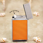 Karl Wieden KW-T0201B open petrol lighter showing wick-style mechanism and yellow side-slide design