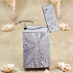 Karl Wieden KW-T0210R open Silver Radiant Geometric butane lighter showing gas outlet mechanism