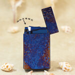 Karl Wieden KW-T0222A open petrol lighter showing wick-style mechanism and blued arabesque finish