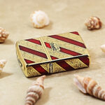 Zippo Armor KZ092 lighter angled view showing decorated case edges