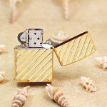 Zippo Armor gold-tone double-sided stripe lighter open reverse view