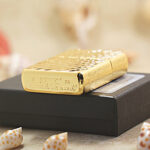 Zippo Armor gold-tone diagonal stripe lighter bottom and case detail