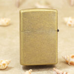 Zippo Classic antique brass-tone LOVE lighter plain reverse view