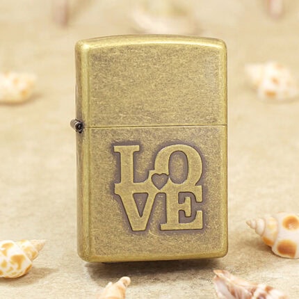Zippo Classic antique brass-tone LOVE lighter front view