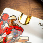 LUBINSKI LB-DA2001 cigar ashtray gold-tone cigar rest and artwork detail