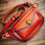 LUBINSKI leather cigar accessory shoulder bag in brown and green