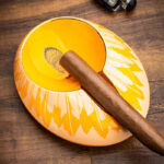 LUBINSKI YJA-20057 yellow ceramic single-cigar ashtray with gold-tone trim in use